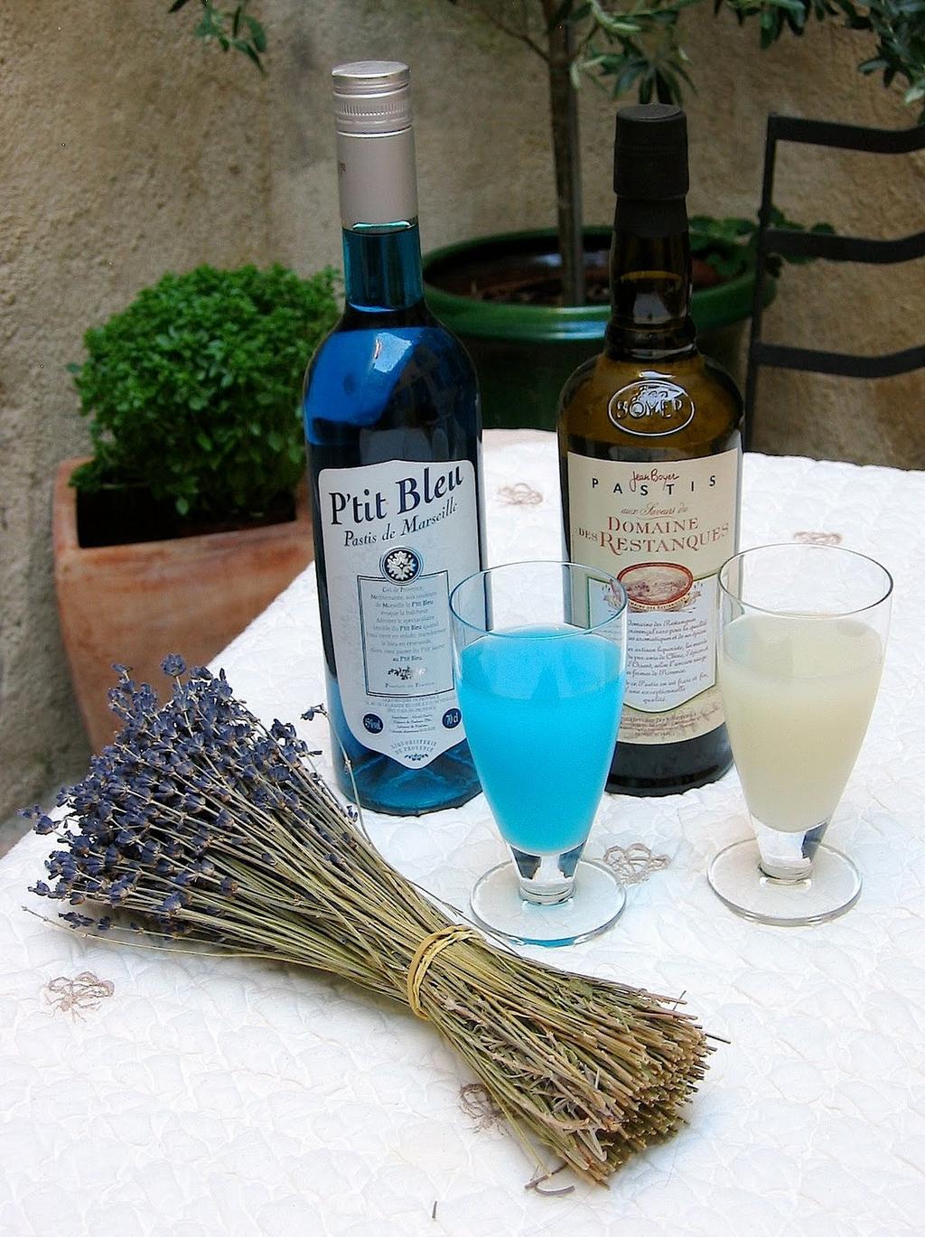 France, Bouches du Rhone, aperitif in Provence with the Pastis Bleu Janot  typical aniseed_flavoured alcohol, here colored in blue - SuperStock